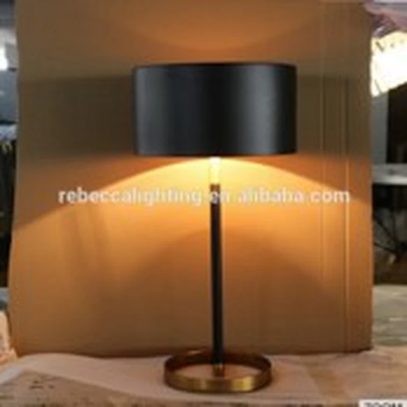round black shade and brass base bedside table lamp