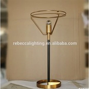 round black shade and brass base bedside table lamp