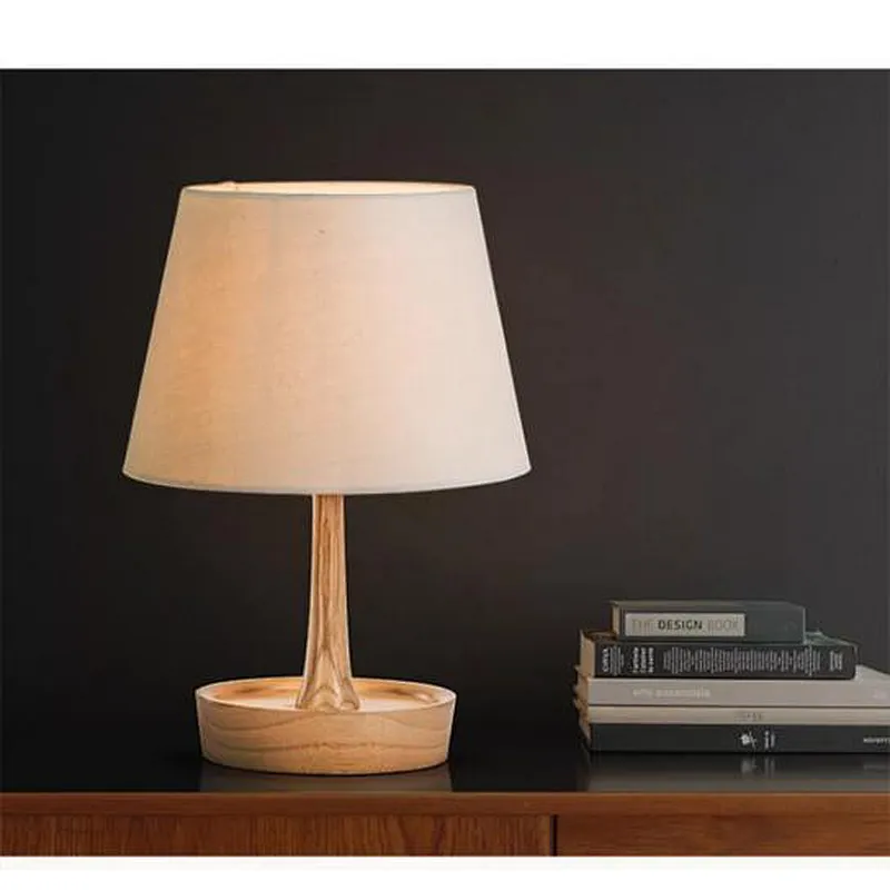 Adjustable wooden table lamp with parchment shade