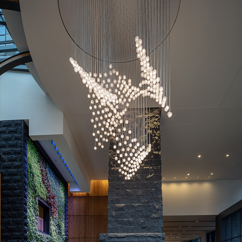 Modern luxury dining hotel lobby large wedding ceiling lights chandeliers