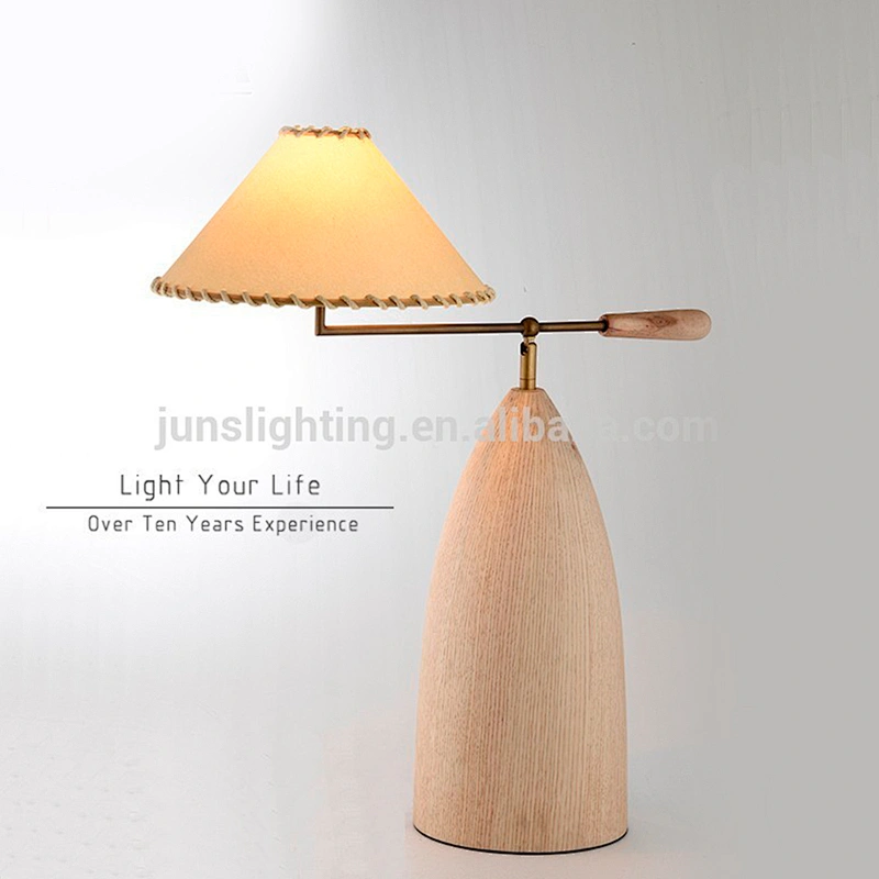 Adjustable wooden table lamp with parchment shade
