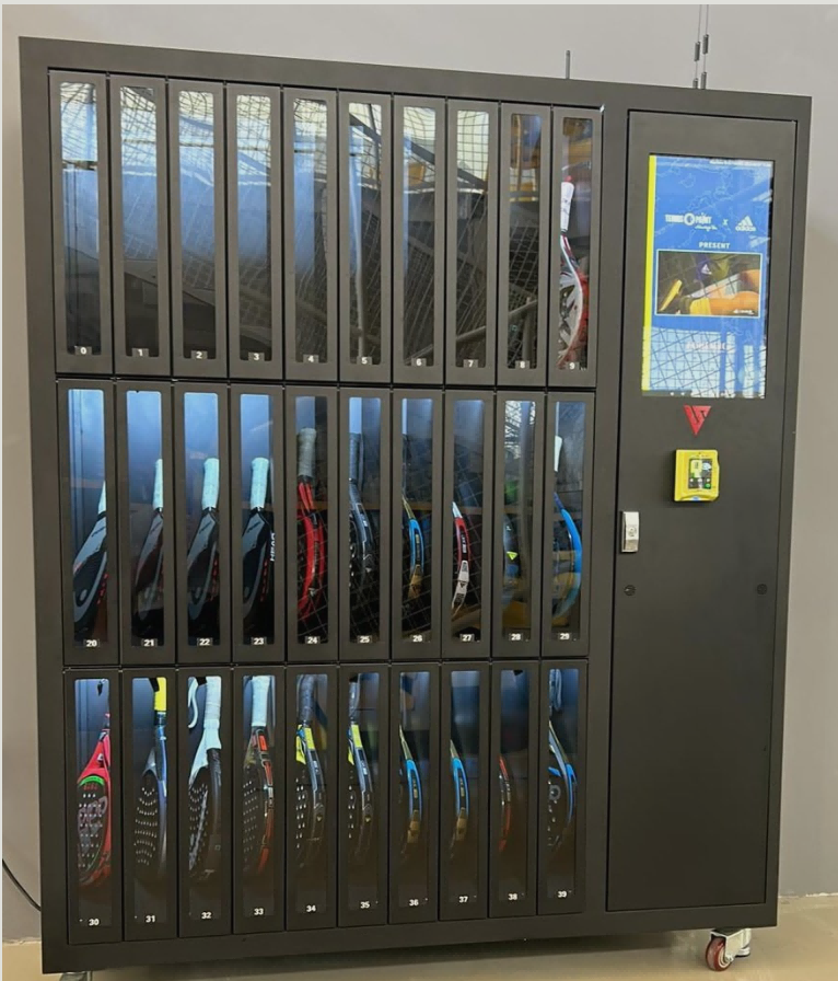 Right-side view of the blue fishing rod rental cabinet with five tall locker doors
