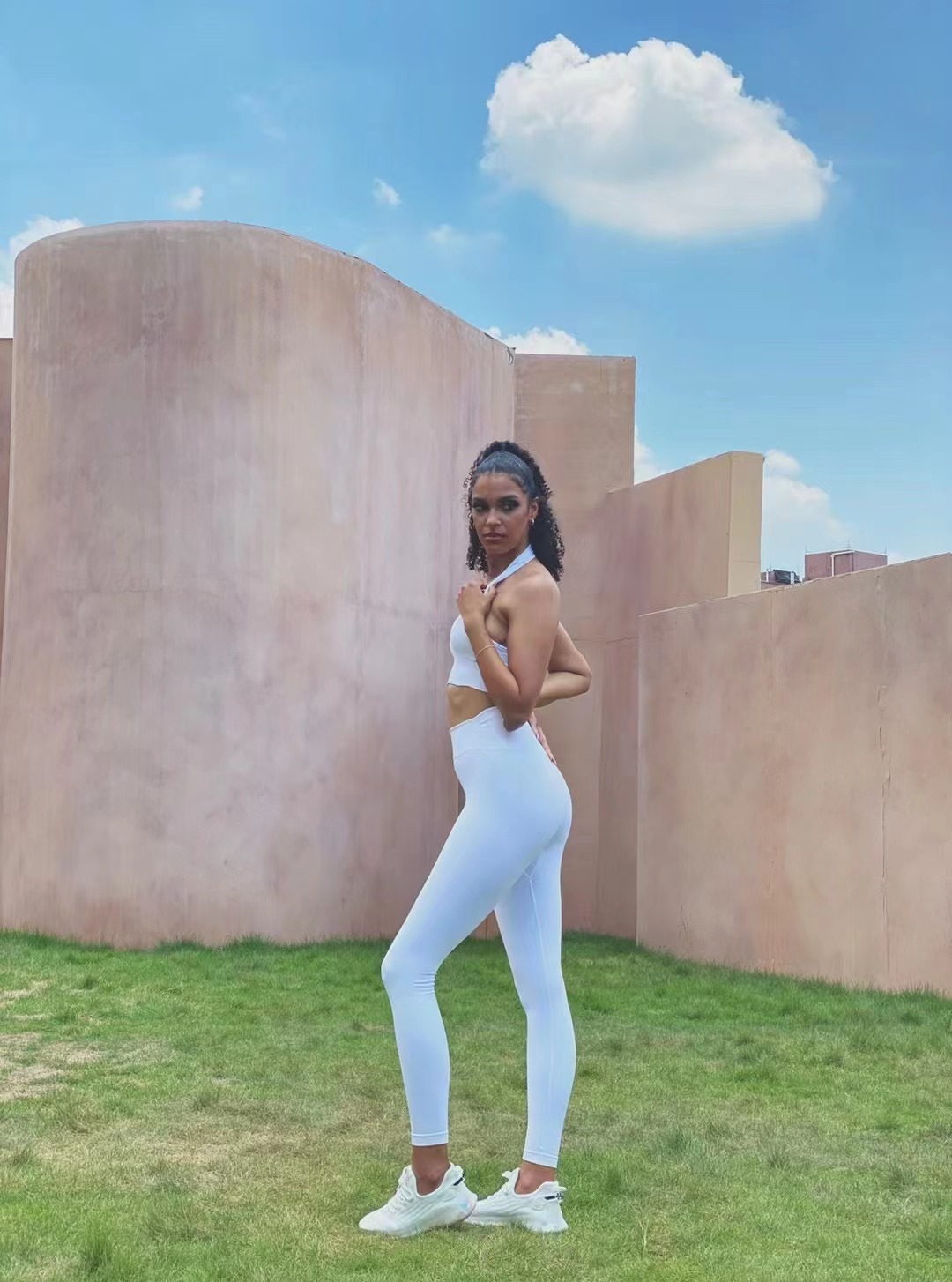 this models looks stunning in our plain yoga set