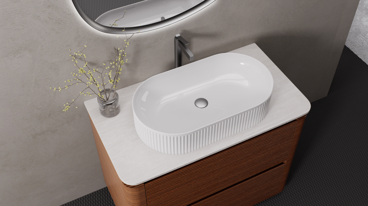 A vessel sink creates a more decorative countertop arrangement and can emphasize the vanity as a furniture feature.