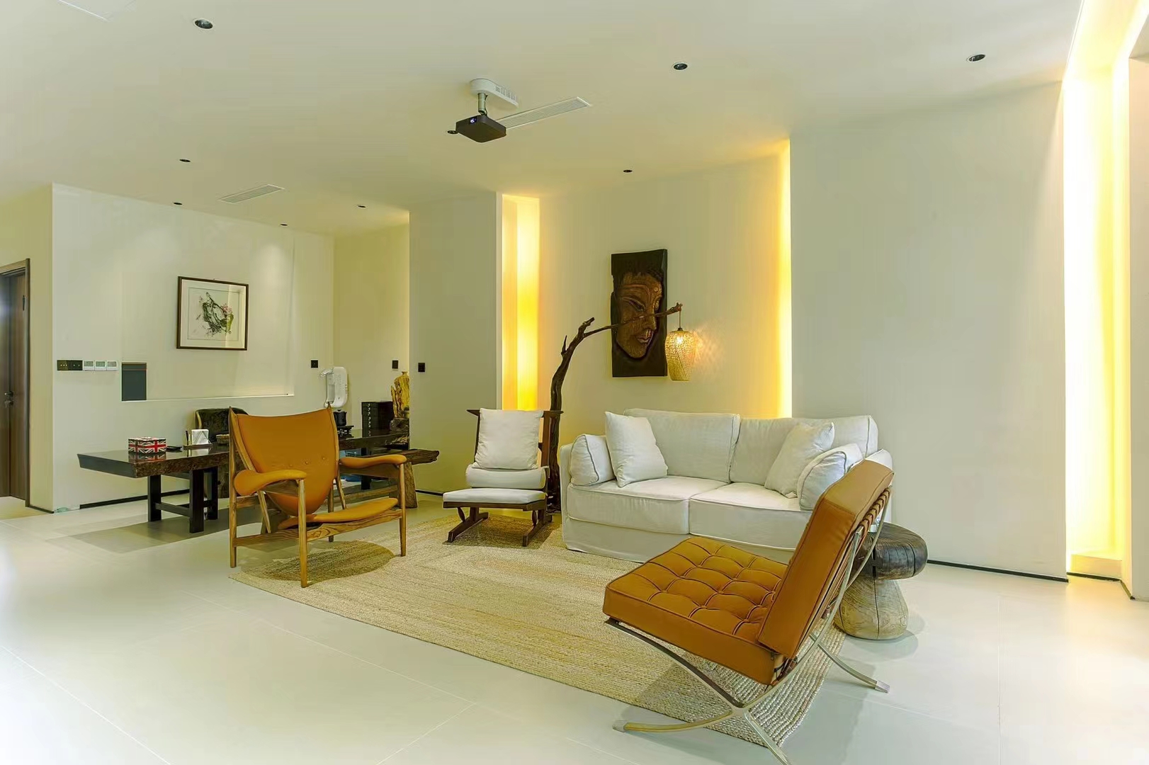 A sumptuous bathtub offers a tranquil escape, inviting relaxation after a day of exploration. Additionally, the smart toilet adds an innovative touch, prioritizing convenience and hygiene. To round out this modern oasis, a wall mounted towel warmer is seamlessly integrated into the design, delivering both warmth and sophistication.