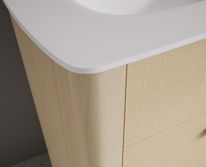 These details can be repeated through curved mirrors and rounded basin forms to create a more cohesive bathroom.
