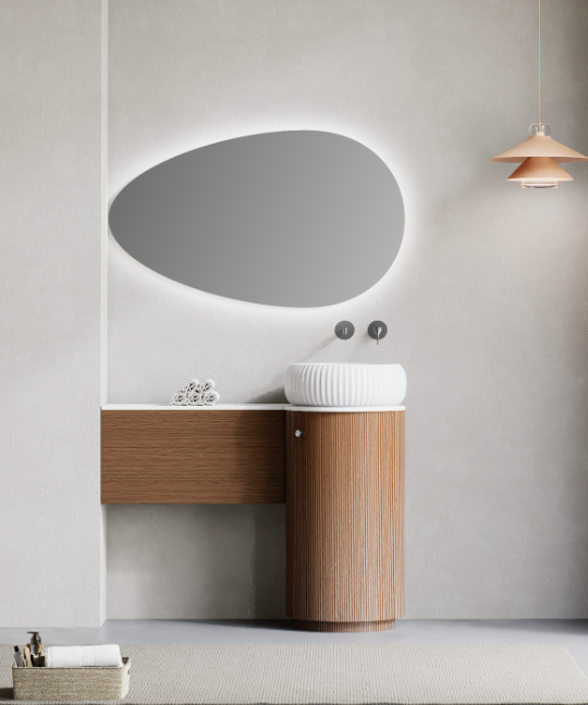 Modern pedestal sink used as a freestanding bathroom wash basin