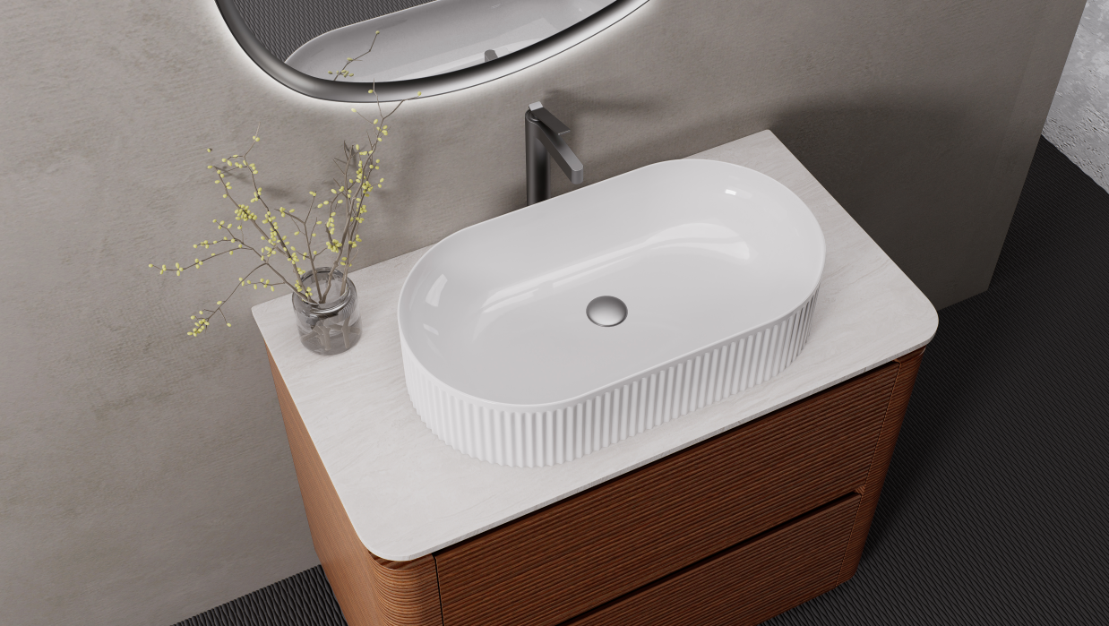 A vessel sink sits above the countertop and creates a stronger furniture-like look.