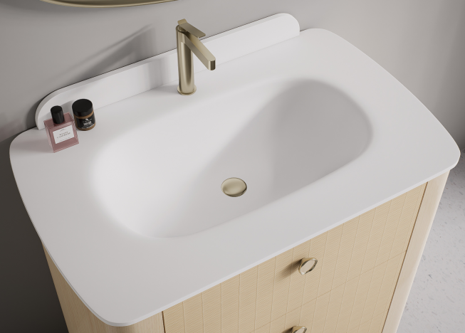 The cabinet front features a refined textured surface that creates a gentle visual rhythm.