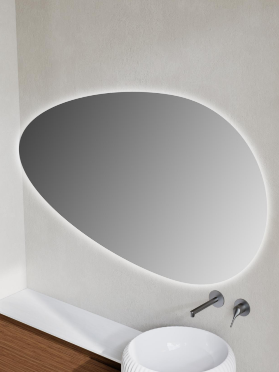 Large horizontal or irregular-shaped mirrors can create a stronger composition above the vanity