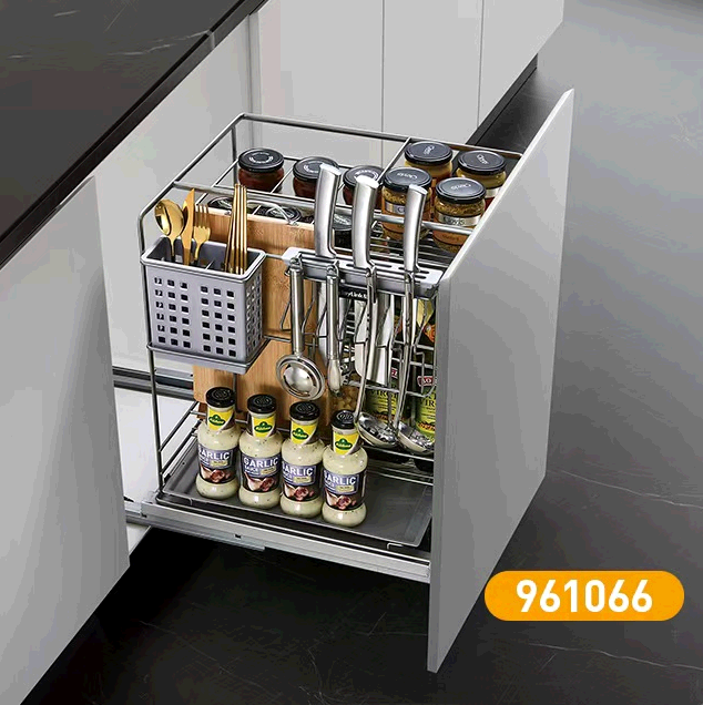 The use of high-quality plywood for the kitchen cabinets ensures durability while adding a warm aesthetic to the space. The plywood kitchen cabinets, each section is meticulously designed to maximize storage, featuring clever kitchen cabinet organizers that keep essentials neatly arranged and easily accessible.