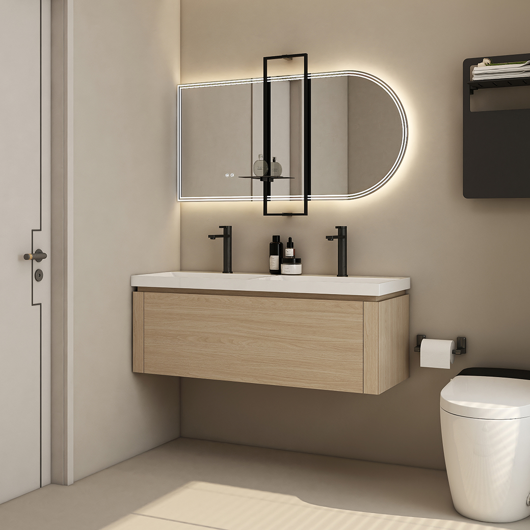 Introducing our Minimalist wood grain color wall mounted bathroom cabinet, a sleek and stylish addition to any bathroom. This exquisite piece features a medicine cabinet with mirror, offering both functionality and elegance. The single bathroom vanity with sink provides a convenient and practical solution for daily grooming routines. The wall mounted bathroom vanity design not only saves space but also adds a modern touch to your bathroom decor. Our high-quality bathroom medicine cabinet with mirror ensures that all your essentials are neatly stored and easily accessible. As a leading bathroom cabinet wholesale supplier, we are pleased to offer this stunning piece at a great value. Don't miss out on our exclusive bathroom cabinets for sale and elevate your bathroom with the Minimalist wood grain color wall mounted bathroom cabinet today.