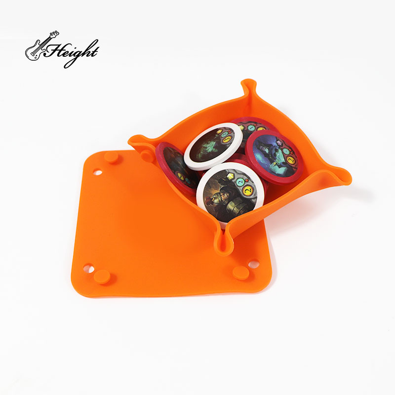 1 orange dice bowl with several tokens