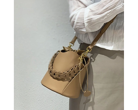 Drawstring Bucket Bag, trendy and practical, spacious compartment, adjustable straps, stylish design, high-quality materials, perfect for everyday use, versatile accessory, multiple color options, fashion-forward statement piece.