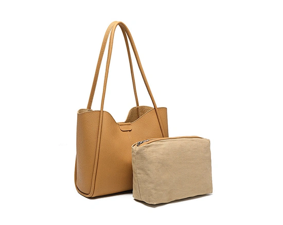 Our elegant tan crossbody purse! The tan color is versatile and complements any outfit, making it a must-have accessory for every fashion-conscious woman. Made from high-quality materials, our crossbody purse is durable and built to last.