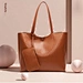 This leather tote is made of high-quality waxed cowhide leather(genuine leather) with durable hardware, Top smooth Zip Closure. Presents the elegant and leisure style. This leather handbag can fit up to 12.9” tablet.