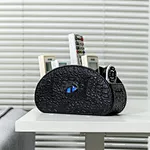 remote holder for bed