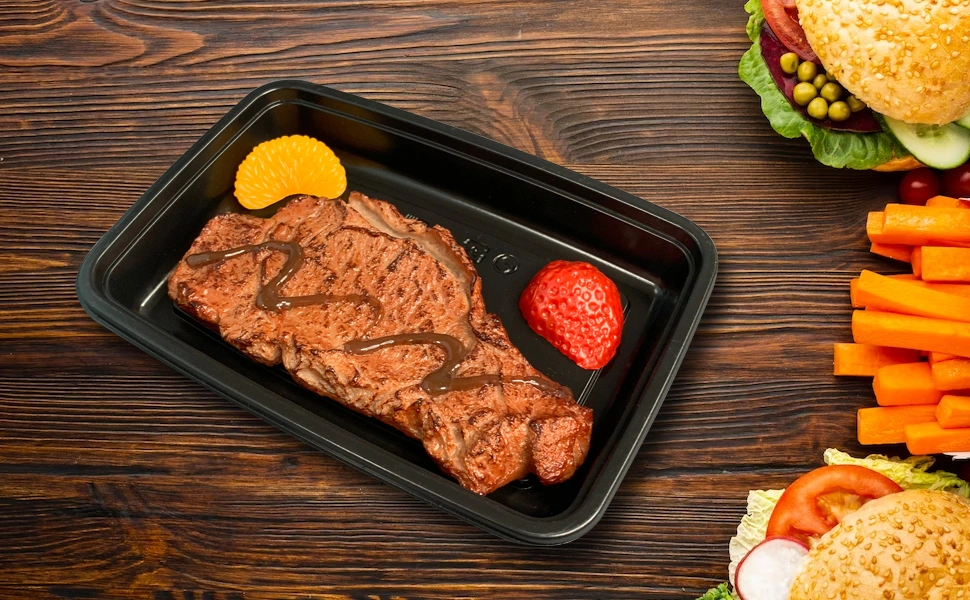 Plastic Takeaway Box of Steaks