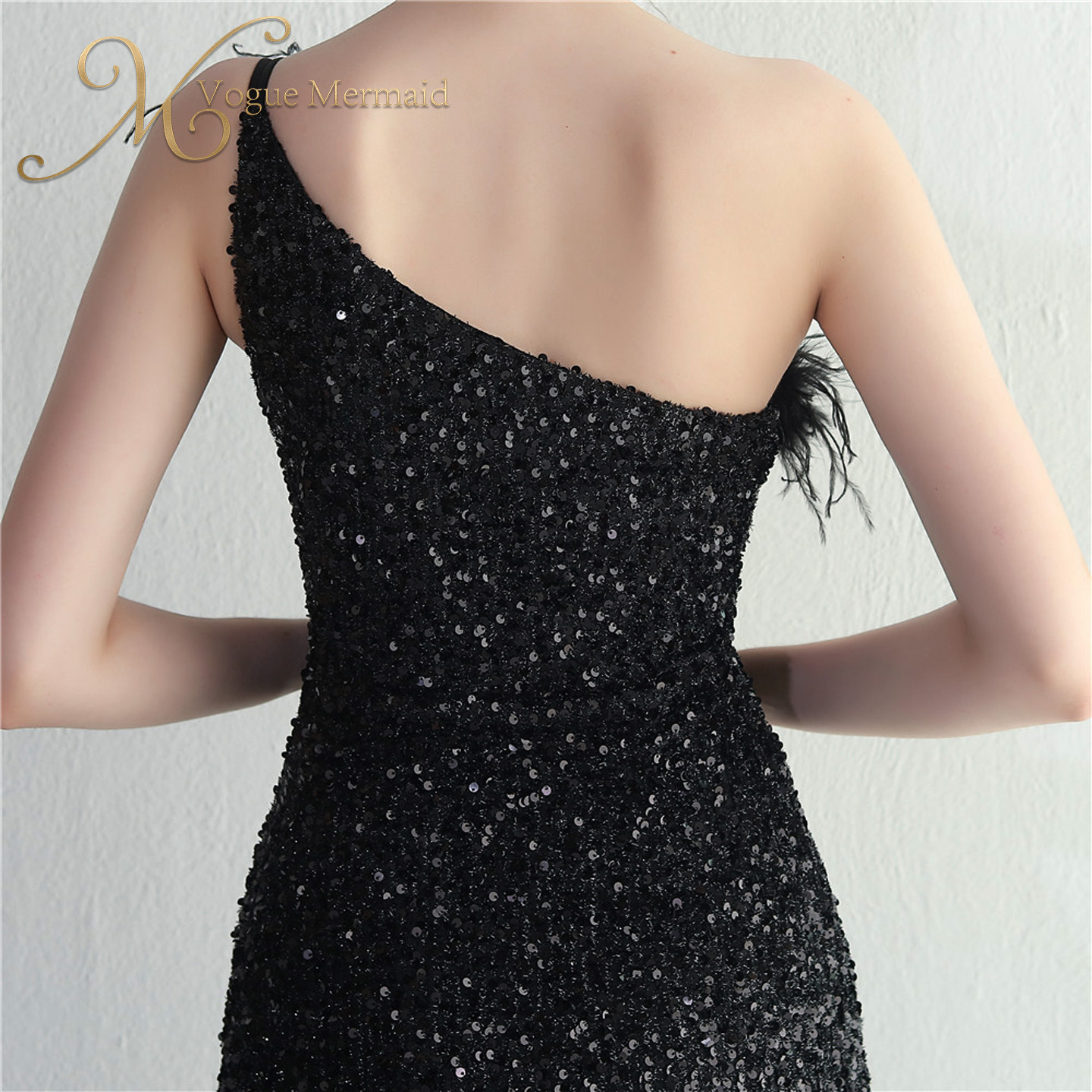 one-shoulder black sequin dress