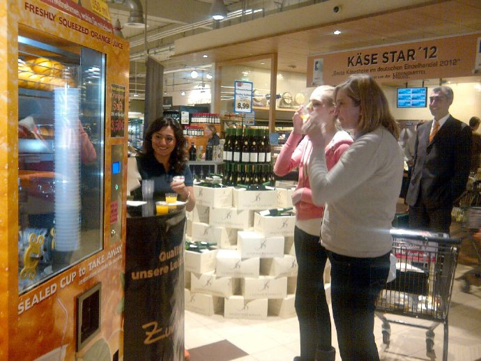 How much does it cost to operate an orange juice vending machine?