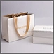 paper bag with ribbon handle