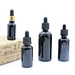 original black uv oil bottle essential oil serum hair oil black violet glass bottle 30 ml uv glass pump bottle with dropper