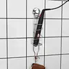 Suction cup hair straightener holder