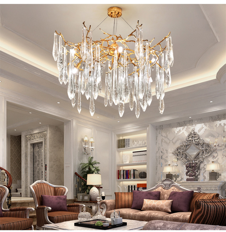 wide branch crystal chandelier over dining table