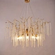 short crystal chandelier hanging over table