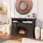 tv stand with fireplace nearby