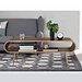The light wood square coffee table, with its heaviness and stability, gives people a strong sense of peace of mind, as if all restlessness and irritability can be calmed and comforted in front of it.