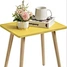 This yellow home coffee table brightens up the space with its vivid color and features rounded corners for safety. Its simple design suits various styles, making it a great choice for cozy gatherings in the living room.