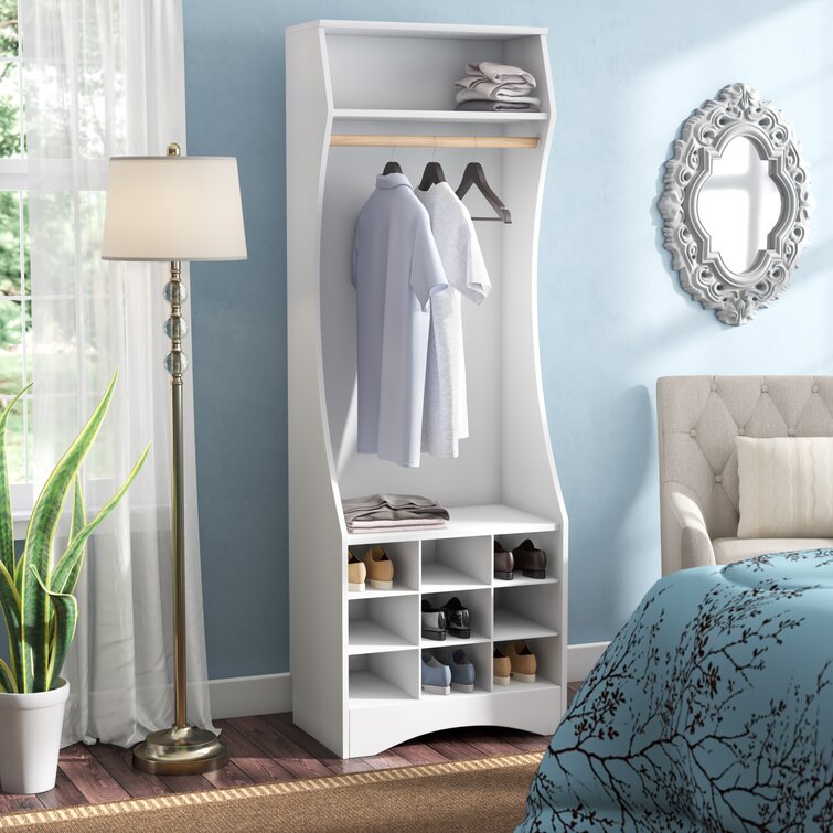 White oak wardrobe with curved design in modern bedroom