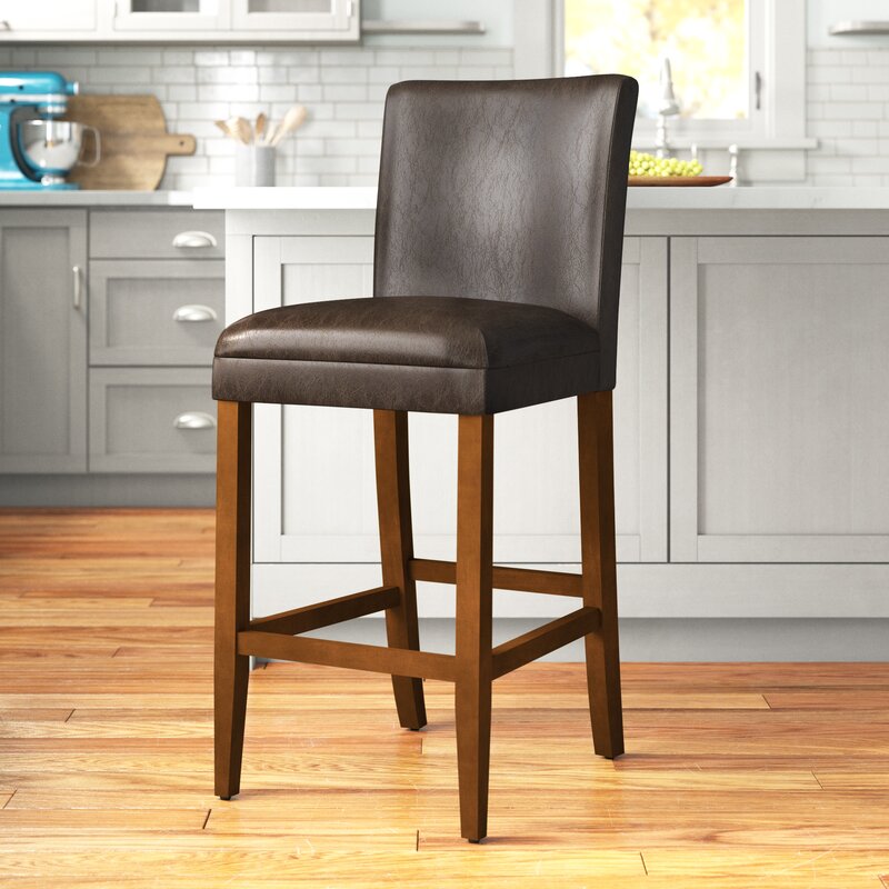 close-up leather texture and solid wood legs
