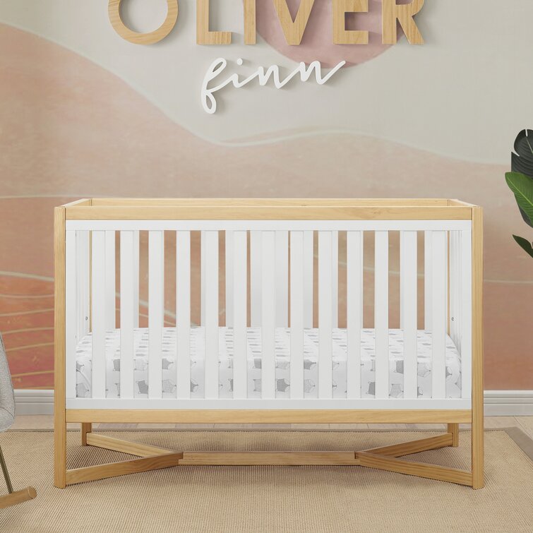 Crib with storage drawer and soft mattress
