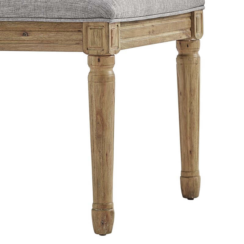 craftsmanship details on chair frame and stitching