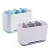 plastic toothpaste and toothbrush holder