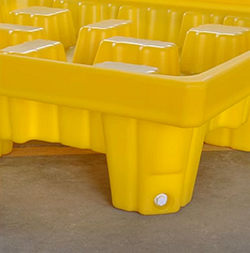 Spill pallet with drain grooves
