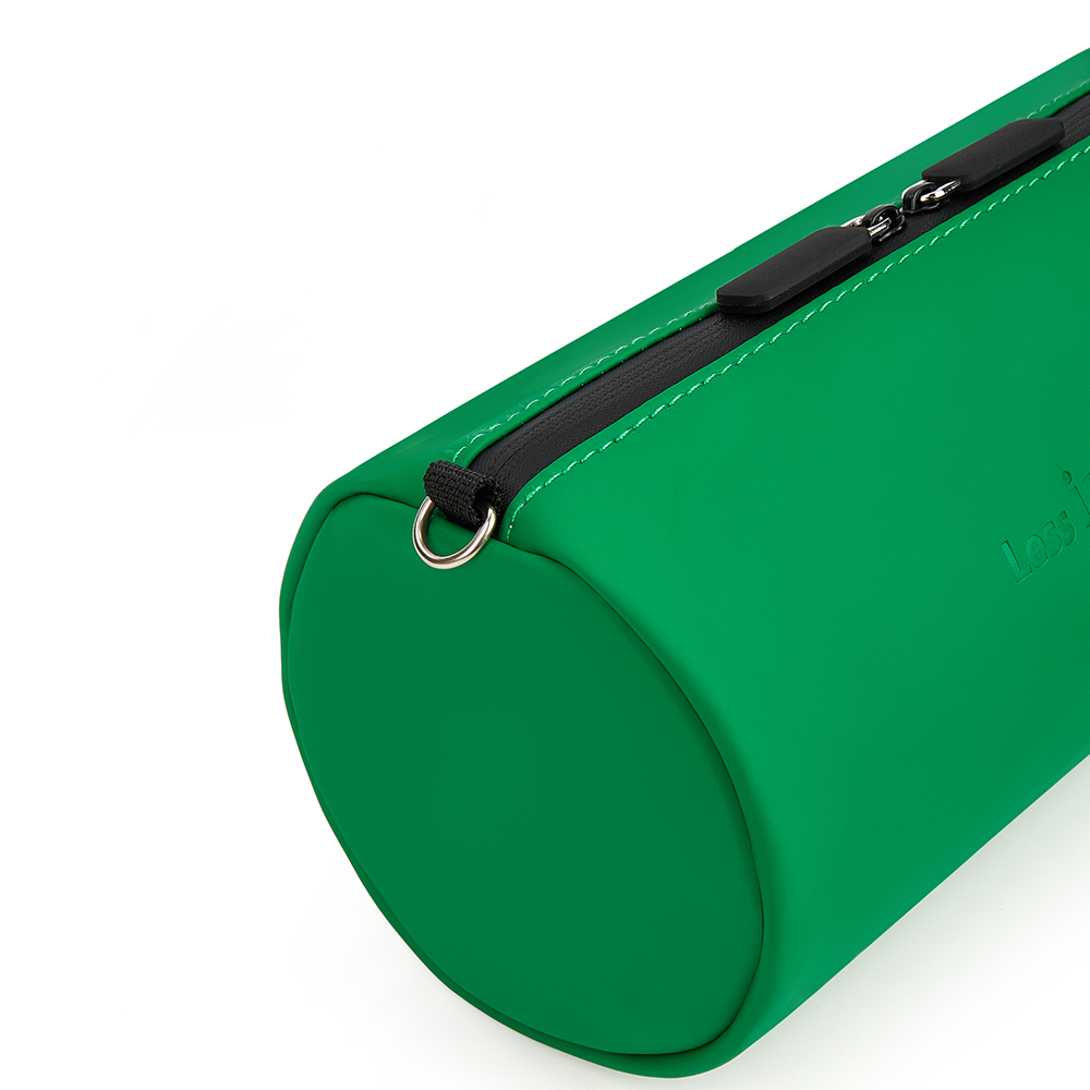 green leather bag and pencil case