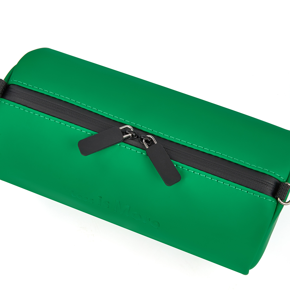 green leather bag and pencil case