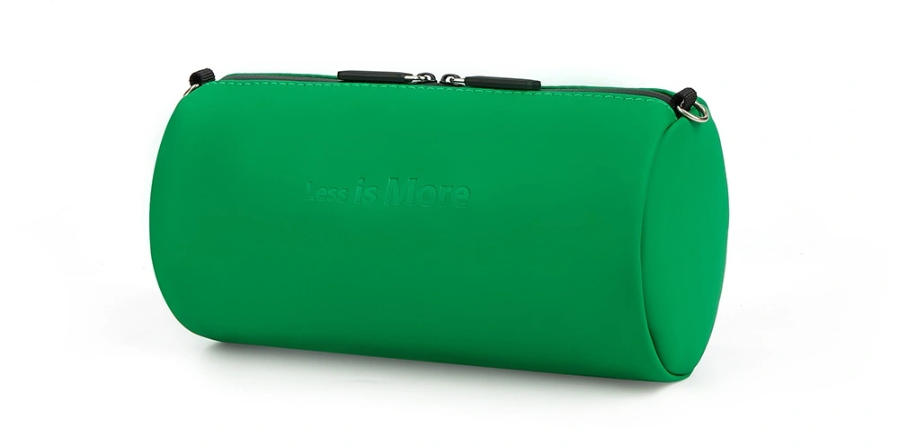 green leather bag and pencil case