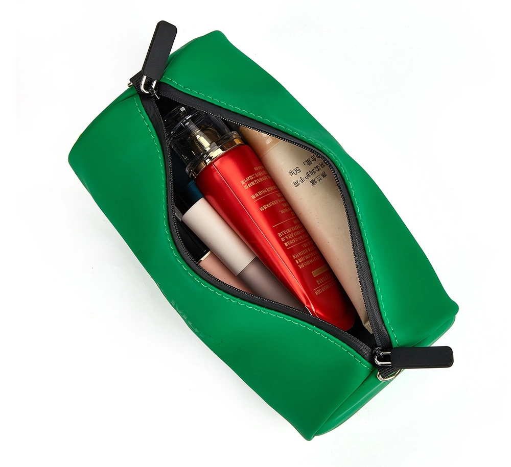 green leather bag and pencil case