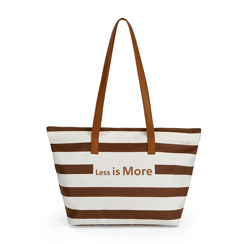 A stylish brown and white striped tote bag with “Less is More”sublimation printed, showcasing a chic design.