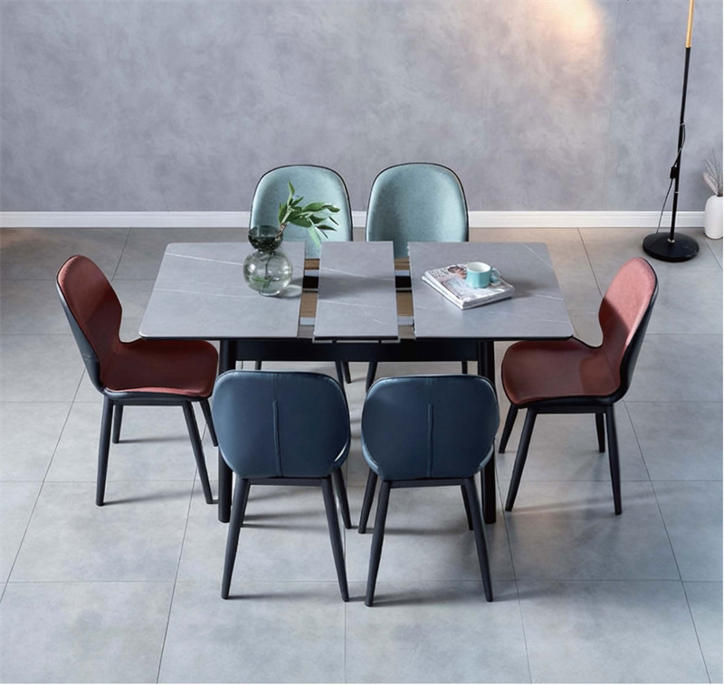 Central extension table frame with synchronized sliding mechanism