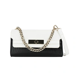 white and black alligator handbag