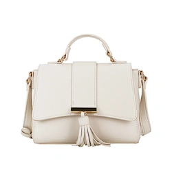 white handbag with tassel ornament
