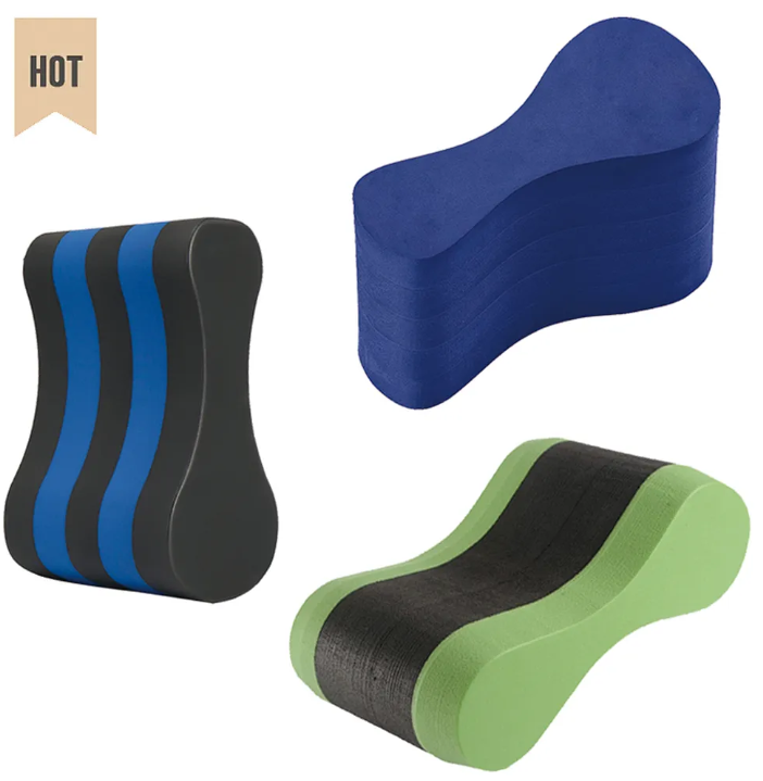Child using kickboard for swimming practice