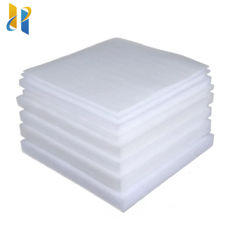 Custom die-cut EPE foam inserts securely holding electronic components in a box