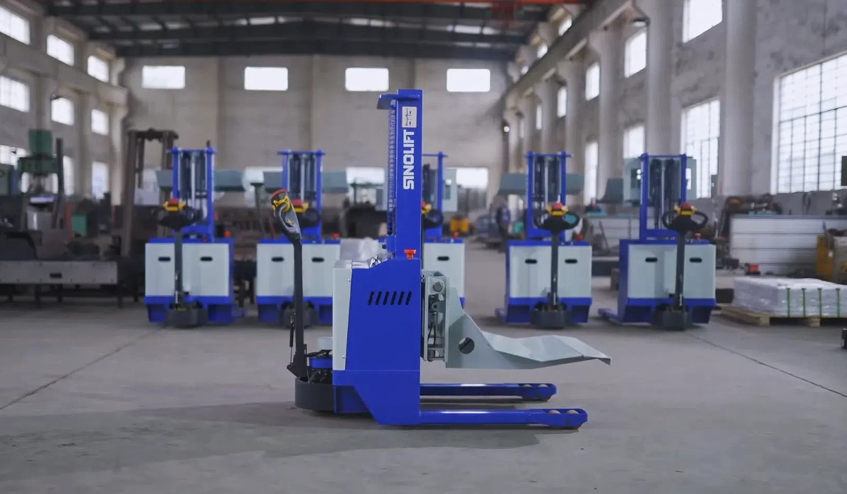 Precision placement of paper rolls with lateral displacement feature on an electric lifter