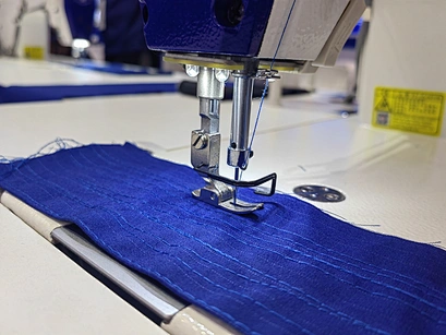 two needle lockstitch sewing machine